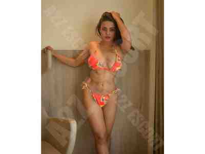 Escort service in Margao with stunning companions, playful brunette escort in Margao enjoying the outdoors